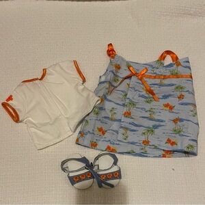 American girl bitty baby Hawaiian dress with island floral print.Comes with book